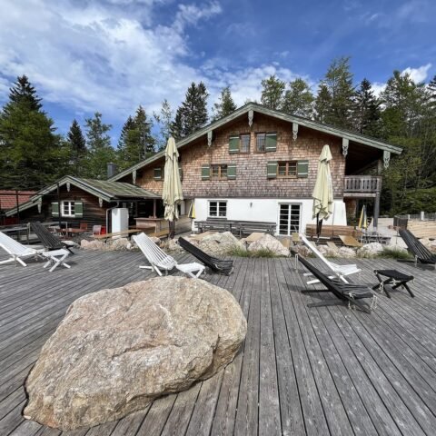 Mountain lodge terrace with loungers
